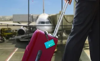 Photo d'une étiquette Nolostt posée sur une valise